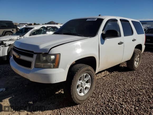 2011 Chevrolet Tahoe Commercial with VIN 1GNSK4E02BR233063, listed as a Copart auction lot 77144904 with 168,518 mi miles and Clean title. Bid and sale history available at DreamBid. Image 1.