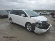 ✅ 2014 Toyota Sienna LE • VIN: 5TDKK3DC1ES482975 • Lot: 89934545. Listed on Copart with 128,305 mi. Free auction sales archive from the USA and detailed vehicle history report at DreamBid. Image 4.