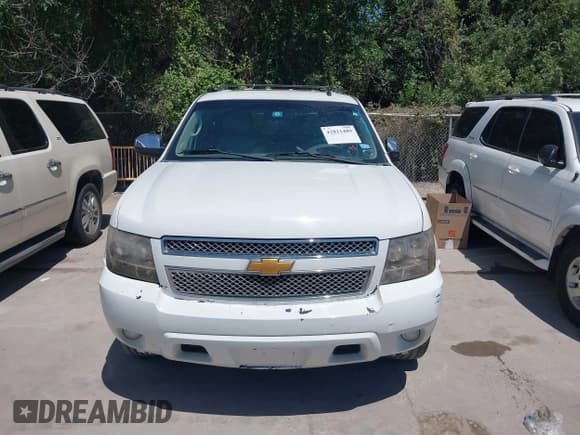 ✅ 2014 Chevrolet Tahoe LT • VIN: 1GNSCBE03ER213054 • Lot: 42821489. Listed on IAAI with 166,689 mi. Free auction sales archive from the USA and detailed vehicle history report at DreamBid. Image 12.