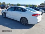 ✅ 2017 Ford Fusion Hybrid Titanium • VIN: 3FA6P0RU3HR323164 • Lot: 42303571. Listed on IAAI with 119,732 mi. Free auction sales archive from the USA and detailed vehicle history report at DreamBid. Image 3.