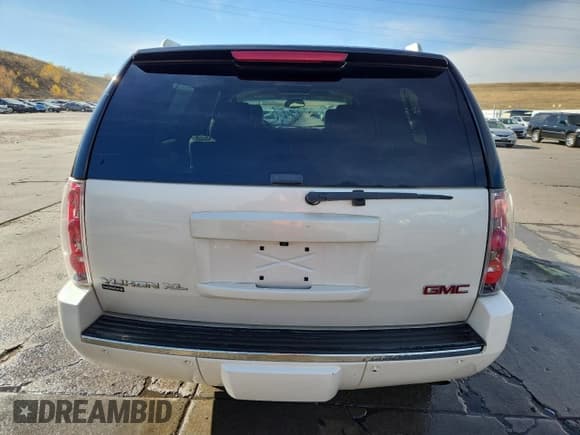 ✅ 2013 GMC Yukon XL Denali • VIN: 1GKS2MEF9DR360882 • Lot: 87124145. Wystawiony na Copart z przebiegiem 134 774 mil. Bezpłatny archiwum sprzedaży aukcyjnych z USA i szczegółowy raport historii pojazdu na DreamBid. Zdjęcie 6.