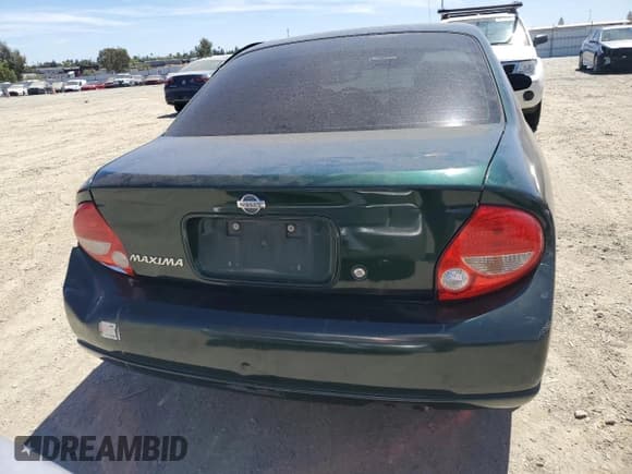 ✅ 2001 Nissan Maxima GXE • VIN: JN1CA31D41T606921 • Лот: 66935545. Опубликован ранее на Copart с пробегом 231 390 миль. Бесплатный доступ к архиву аукционных продаж из США и подробный отчёт об истории автомобиля на DreamBid. Изображение 6.