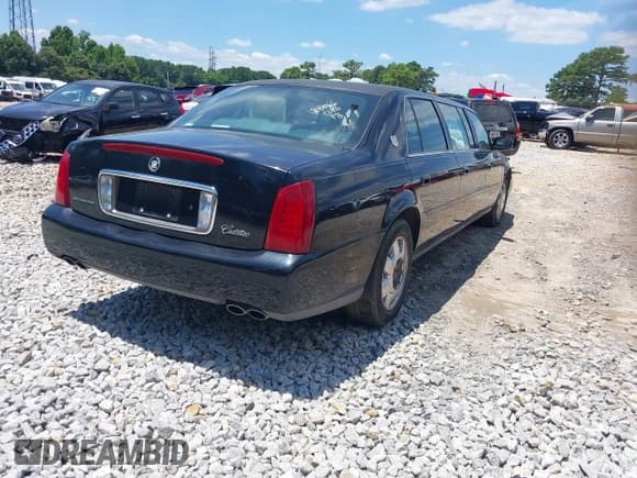 ✅ 2001 Cadillac DeVille Funeral Coach • VIN: 1GEEH90Y31U550819 • Lot: 41258778. Listed on IAAI with 49,587 mi. Free auction sales archive from the USA and detailed vehicle history report at DreamBid. Image 4.