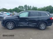 ✅ 2019 Honda Pilot EX-L • VIN: 5FNYF6H51KB061852 • Лот: 42501422. Опубликован ранее на IAAI с пробегом 95 258 миль. Бесплатный доступ к архиву аукционных продаж из США и подробный отчёт об истории автомобиля на DreamBid. Изображение 14.
