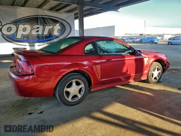 ✅ 2003 Ford Mustang Standard • VIN: 1FAFP40493F322742 • Lot: 96330455. Listed on Copart with 89,852 mi. Free auction sales archive from the USA and detailed vehicle history report at DreamBid. Image 3.