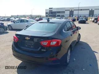 ✅ 2017 Chevrolet Cruze LT • VIN: 1G1BE5SMXH7251661 • Lot: 43163298. Listed on IAAI with 96,627 mi. Free auction sales archive from the USA and detailed vehicle history report at DreamBid. Image 4.