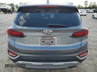 ✅ 2019 Hyundai Santa Fe Ultimate • VIN: 5NMS53AA7KH034491 • Lot: 65342924. Wystawiony na Copart z przebiegiem 144 399 mil. Bezpłatny archiwum sprzedaży aukcyjnych z USA i szczegółowy raport historii pojazdu na DreamBid. Zdjęcie 6.