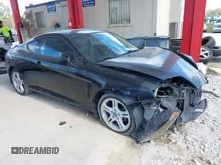 2006 Hyundai Tiburon GT z VIN KMHHN65F56U224768, wystawiony jako IAAI lot #40672721 z przebiegiem 158 535 mil mil oraz . Historia ofert i sprzedaży dostępna na DreamBid. Obrazek 1.