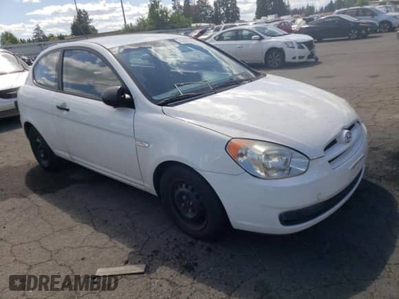 2007 Hyundai Accent GS with VIN KMHCM36C37U004904, listed as a Copart auction lot 61291504 with 158,700 mi miles and Clean title. Bid and sale history available at DreamBid. Image 4.