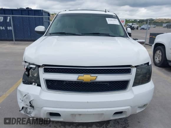 2014 Chevrolet Suburban LT z VIN 1GNSCJE02ER153469, wystawiony jako IAAI lot #42481563 z przebiegiem 249 441 mil mil oraz . Historia ofert i sprzedaży dostępna na DreamBid. Obrazek 13.