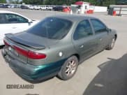 ✅ 1999 Ford Contour LX • VIN: 1FAFP66L9XK201636 • Лот: 42808815. Опубликован ранее на IAAI с пробегом 121 359 миль. Бесплатный доступ к архиву аукционных продаж из США и подробный отчёт об истории автомобиля на DreamBid. Изображение 4.