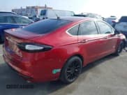 ✅ 2014 Ford Fusion Titanium • VIN: 3FA6P0SU4ER111654 • Лот: 43015858. Опубликован ранее на IAAI с пробегом 140 806 миль. Бесплатный доступ к архиву аукционных продаж из США и подробный отчёт об истории автомобиля на DreamBid. Изображение 4.
