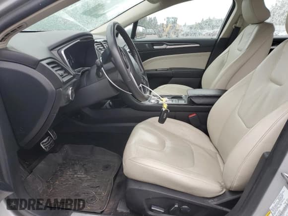 ✅ 2017 Ford Fusion Hybrid Titanium • VIN: 3FA6P0RU2HR287581 • Lot: 82467875. Listed on Copart with 69,229 mi. Free auction sales archive from the USA and detailed vehicle history report at DreamBid. Image 7.