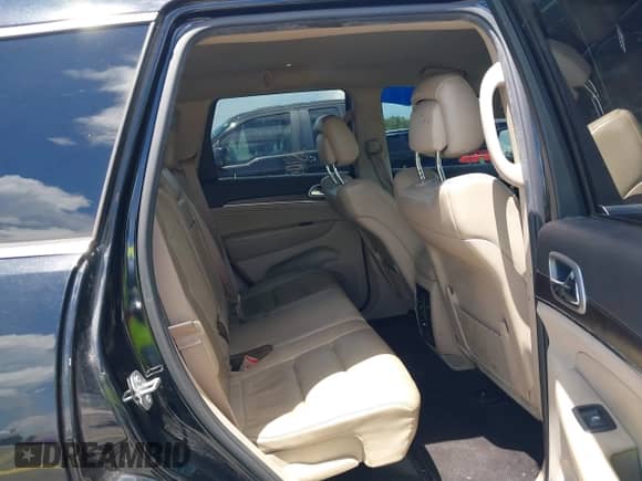 2018 Jeep Grand Cherokee Limited z VIN 1C4RJEBG7JC353475, wystawiony jako IAAI lot #43057910 z przebiegiem 87 674 mil mil oraz . Historia ofert i sprzedaży dostępna na DreamBid. Obrazek 8.