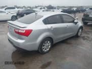 ✅ 2013 Kia Rio EX • VIN: KNADN4A33D6117204 • Lot: 43862080. Listed on IAAI with 168,000 mi. Free auction sales archive from the USA and detailed vehicle history report at DreamBid. Image 4.