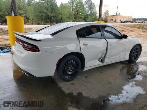 ✅ 2022 Dodge Charger SXT • VIN: 2C3CDXBG1NH189110 • Лот: 90427015. Опубликован ранее на Copart с пробегом 47 699 миль. Бесплатный доступ к архиву аукционных продаж из США и подробный отчёт об истории автомобиля на DreamBid. Изображение 3.