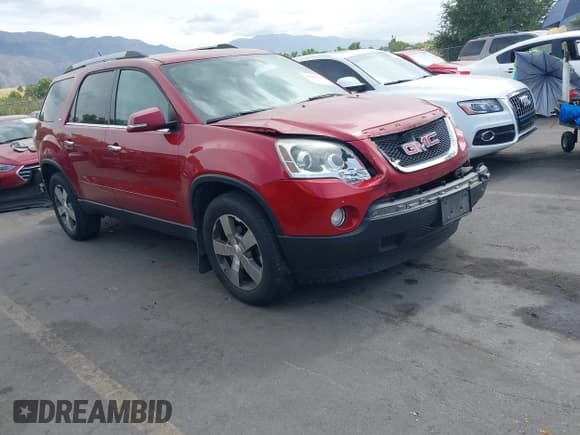 ✅ 2012 GMC Acadia SLT2 • VIN: 1GKKVSED4CJ129203 • Lot: 43198382. Listed on IAAI with 140,933 mi. Free auction sales archive from the USA and detailed vehicle history report at DreamBid. Image 1.