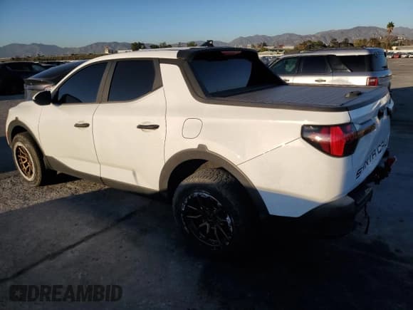 ✅ 2022 Hyundai Santa Cruz SEL • VIN: 5NTJBDAE5NH001866 • Lot: 90853285. Listed on Copart with 49,387 mi. Free auction sales archive from the USA and detailed vehicle history report at DreamBid. Image 2.