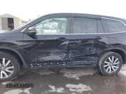 ✅ 2020 Honda Pilot EX-L • VIN: 5FNYF6H50LB022798 • Lot: 41592012. Listed on IAAI with 67,045 mi. Free auction sales archive from the USA and detailed vehicle history report at DreamBid. Image 6.