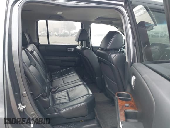 ✅ 2012 Honda Pilot EX-L • VIN: 5FNYF4H79CB003740 • Lot: 43812027. Listed on IAAI with 236,841 mi. Free auction sales archive from the USA and detailed vehicle history report at DreamBid. Image 8.