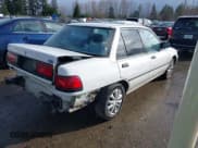 ✅ 1993 Ford Escort • VIN: 3FAPP13J9PR205353 • Lot: 41837169. Listed on IAAI with 4,016 mi. Free auction sales archive from the USA and detailed vehicle history report at DreamBid. Image 4.