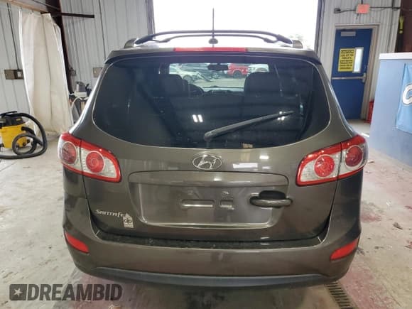 ✅ 2012 Hyundai Santa Fe SE • VIN: 5XYZH4AG6CG135162 • Lot: 79197764. Listed on Copart with 87,661 mi. Free auction sales archive from the USA and detailed vehicle history report at DreamBid. Image 6.