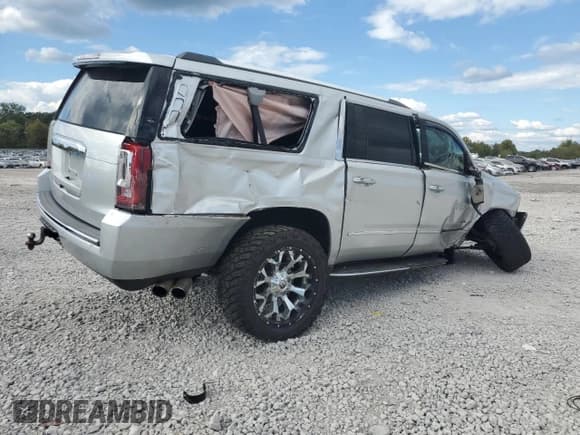 ✅ 2018 GMC Yukon XL Denali • VIN: 1GKS2HKJ4JR104564 • Лот: 84879265. Опубликован ранее на Copart с пробегом 148 672 миль. Бесплатный доступ к архиву аукционных продаж из США и подробный отчёт об истории автомобиля на DreamBid. Изображение 3.