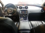 ✅ 2013 Jaguar XJ • VIN: SAJWJ1CD7D8V49599 • Lot: 54008915. Listed on Copart with 133,163 mi. Free auction sales archive from the USA and detailed vehicle history report at DreamBid. Image 9.