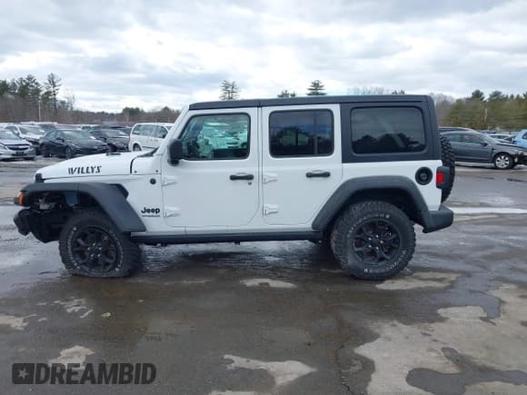 ✅ 2022 Jeep Wrangler Unlimited Sport S • VIN: 1C4HJXDG3NW155467 • Lot: 41638650. Wystawiony na IAAI z przebiegiem 22 698 mil. Bezpłatny archiwum sprzedaży aukcyjnych z USA i szczegółowy raport historii pojazdu na DreamBid. Zdjęcie 14.