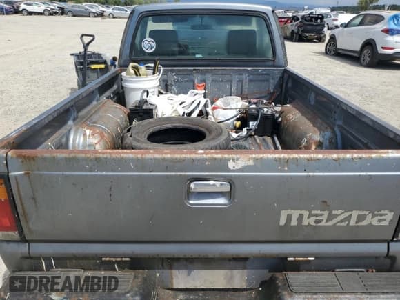 ✅ 1991 Mazda B-Series • VIN: JM2UF1230M0120864 • Лот: 66346775. Опубликован ранее на Copart с пробегом 129 285 миль. Бесплатный доступ к архиву аукционных продаж из США и подробный отчёт об истории автомобиля на DreamBid. Изображение 10.