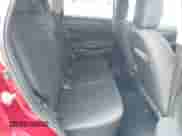 2014 Mitsubishi Outlander ES z VIN 4A4AR3AUXEE026377, wystawiony jako IAAI lot #43252186 z przebiegiem 79 249 mil mil oraz . Historia ofert i sprzedaży dostępna na DreamBid. Obrazek 8.