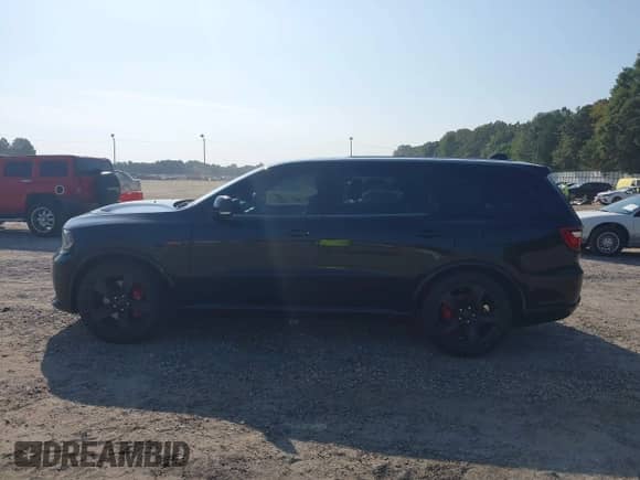 2018 Dodge Durango SRT z VIN 1C4SDJGJ0JC312711, wystawiony jako IAAI lot #43276349 z przebiegiem 155 860 mil mil oraz . Historia ofert i sprzedaży dostępna na DreamBid. Obrazek 14.