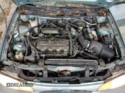 ✅ 1997 Ford Escort LX • VIN: 3FALP15P9VR107467 • Lot: 76061074. Listed on Copart with 69,873 mi. Free auction sales archive from the USA and detailed vehicle history report at DreamBid. Image 12.