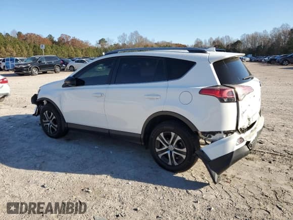 ✅ 2018 Toyota RAV4 LE • VIN: JTMBFREV5JJ727484 • Lot: 92727435. Listed on Copart with 106,604 mi. Free auction sales archive from the USA and detailed vehicle history report at DreamBid. Image 2.