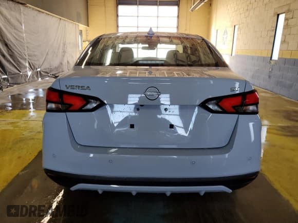 ✅ 2023 Nissan Versa SV • VIN: 3N1CN8EVXPL831779 • Лот: 85718125. Опубликован ранее на Copart с пробегом 56 696 миль. Бесплатный доступ к архиву аукционных продаж из США и подробный отчёт об истории автомобиля на DreamBid. Изображение 6.