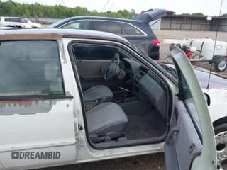 ✅ 1994 Plymouth Sundance • VIN: 1P3AP28K4RN174316 • Lot: 42612754. Listed on IAAI with 147,601 mi. Free auction sales archive from the USA and detailed vehicle history report at DreamBid. Image 5.