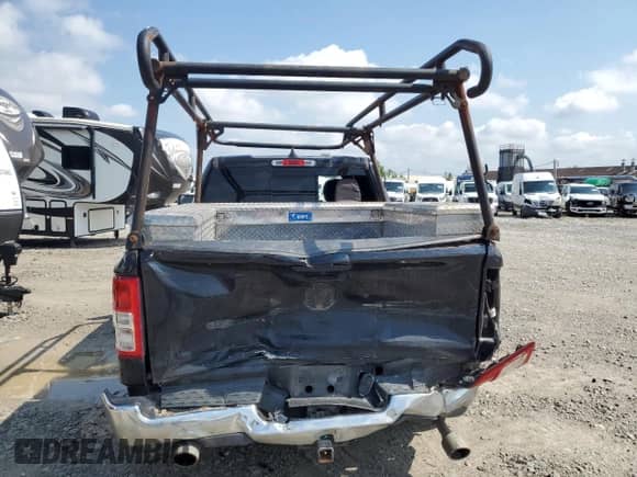 2021 Ram 1500 Big Horn with VIN 1C6SRFBTXMN784535, listed as a Copart auction lot 68456975 with 153,526 mi miles and Salvage title. Bid and sale history available at DreamBid. Image 6.