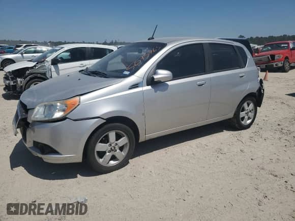 2009 Chevrolet Aveo 1LT with VIN KL1TD66E09B338773, listed as a Copart auction lot 52575765 with 102,617 mi miles and Salvage title. Bid and sale history available at DreamBid. Image 1.