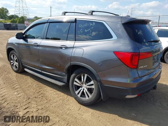 ✅ 2017 Honda Pilot EX-L • VIN: 5FNYF6H54HB014405 • Lot: 43214227. Listed on IAAI with 119,445 mi. Free auction sales archive from the USA and detailed vehicle history report at DreamBid. Image 3.