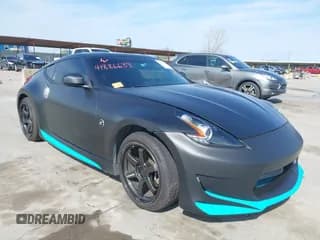 ✅ 2019 Nissan 370Z Sport Touring • VIN: JN1AZ4EH5KM422621 • Lot: 41886639. Wystawiony na IAAI z przebiegiem 28 146 mil. Bezpłatny archiwum sprzedaży aukcyjnych z USA i szczegółowy raport historii pojazdu na DreamBid. Zdjęcie 1.