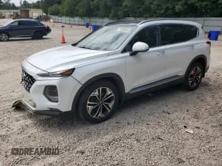 ✅ 2020 Hyundai Santa Fe SEL • VIN: 5NMS3CAA0LH275137 • Лот: 70850865. Опубликован ранее на Copart с пробегом 65 729 миль. Бесплатный доступ к архиву аукционных продаж из США и подробный отчёт об истории автомобиля на DreamBid. Изображение 1.