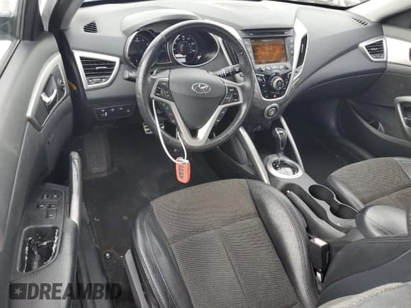 ✅ 2013 Hyundai Veloster w/Gray Int • VIN: KMHTC6AD4DU117406 • Lot: 78792904. Wystawiony na Copart z przebiegiem 89 755 mil. Bezpłatny archiwum sprzedaży aukcyjnych z USA i szczegółowy raport historii pojazdu na DreamBid. Zdjęcie 8.