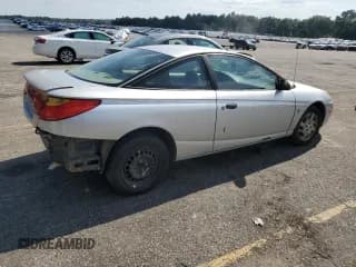 ✅ 2002 Saturn SC • VIN: 1G8ZP12822Z213701 • Лот: 68929934. Опубликован ранее на Copart с пробегом 314 042 миль. Бесплатный доступ к архиву аукционных продаж из США и подробный отчёт об истории автомобиля на DreamBid. Изображение 3.
