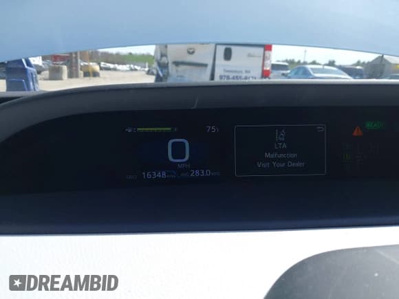 ✅ 2021 Toyota Prius LE • VIN: JTDKAMFP8M3174629 • Lot: 42087974. Listed on IAAI with 16,348 mi. Free auction sales archive from the USA and detailed vehicle history report at DreamBid. Image 7.