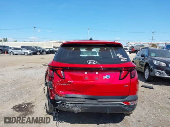 2022 Hyundai Tucson SE z VIN 5NMJACAE3NH069298, wystawiony jako IAAI lot #43183870 z przebiegiem 66 569 mil mil oraz . Historia ofert i sprzedaży dostępna na DreamBid. Obrazek 16.