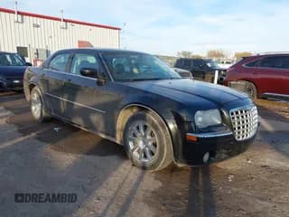 ✅ 2008 Chrysler 300 • VIN: 2C3LA33G98H284602 • Lot: 43662289. Listed on IAAI with 154,056 mi. Free auction sales archive from the USA and detailed vehicle history report at DreamBid. Image 1.