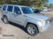 ✅ 2010 Jeep Liberty Sport • VIN: 1J4PN2GK1AW178964 • Lot: 43437287. Listed on IAAI with 124,787 mi. Free auction sales archive from the USA and detailed vehicle history report at DreamBid. Image 1.