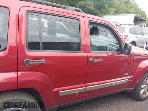 ✅ 2012 Jeep Liberty Sport Latitude • VIN: 1C4PJMAK7CW182736 • Lot: 43166720. Listed on IAAI with 203,639 mi. Free auction sales archive from the USA and detailed vehicle history report at DreamBid. Image 13.