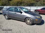 ✅ 2003 Ford Focus SE • VIN: 1FAFP34313W293846 • Lot: 78299994. Listed on Copart with 110,311 mi. Free auction sales archive from the USA and detailed vehicle history report at DreamBid. Image 4.