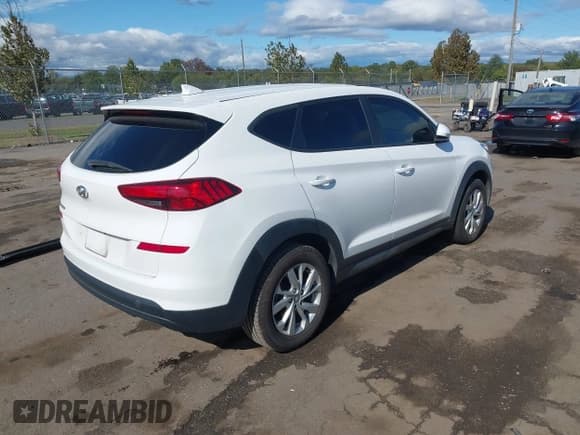 ✅ 2019 Hyundai Tucson SE • VIN: KM8J23A45KU891413 • Лот: 43358358. Опубликован ранее на IAAI с пробегом 106 352 миль. Бесплатный доступ к архиву аукционных продаж из США и подробный отчёт об истории автомобиля на DreamBid. Изображение 4.